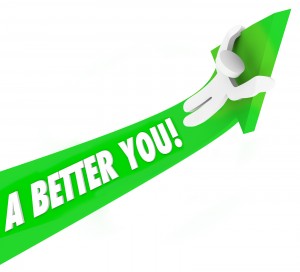 A Better You 3d words on a green arrow and a man riding it upward